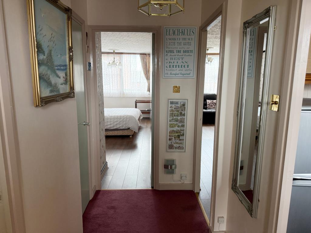 Lot: 111 - BALCONY FLAT FOR UPDATING IN TOWN CENTRE LOCATION - Hallway with doors to all other rooms